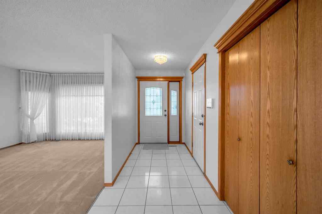 MLS® A2267869 - 13895 Evergreen Street SW in Evergreen Calgary, Residential