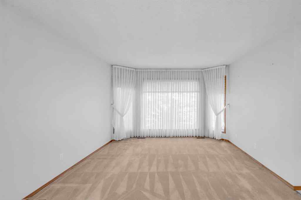 MLS® A2267869 - 13895 Evergreen Street SW in Evergreen Calgary, Residential