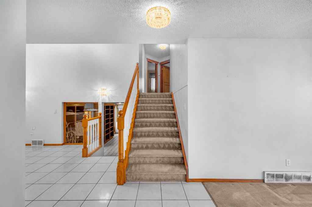 MLS® A2267869 - 13895 Evergreen Street SW in Evergreen Calgary, Residential