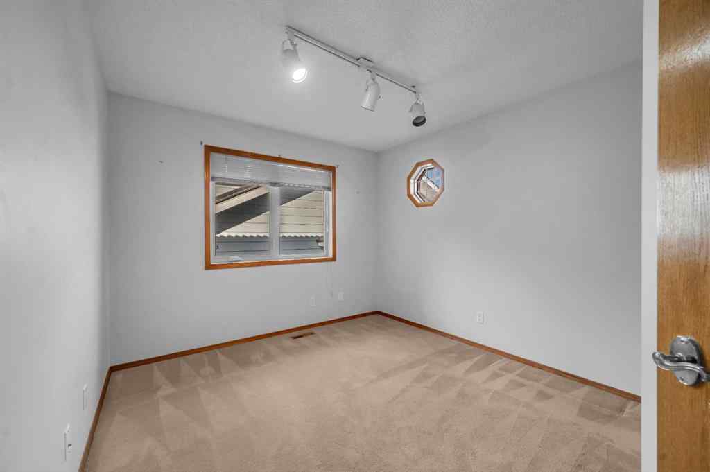 MLS® A2267869 - 13895 Evergreen Street SW in Evergreen Calgary, Residential