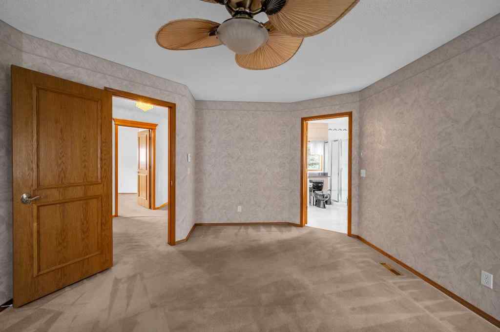 MLS® A2267869 - 13895 Evergreen Street SW in Evergreen Calgary, Residential