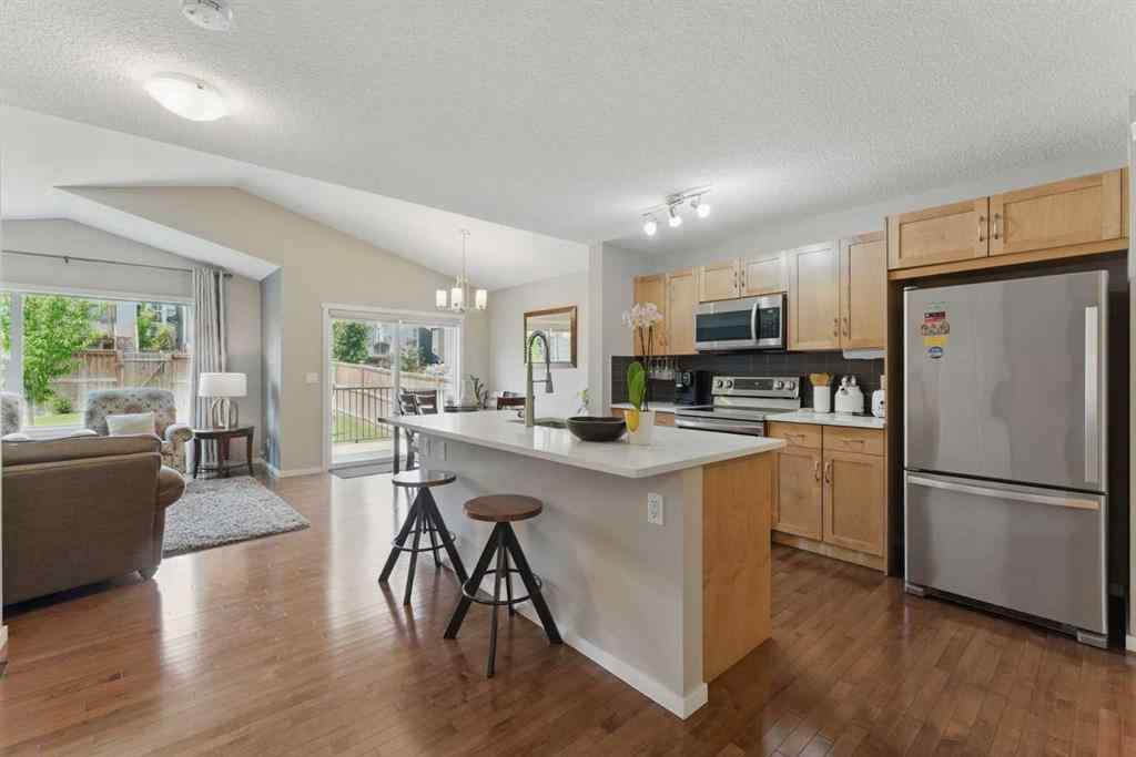 MLS® A2267895 - 19 Sage Bank Road NW in Sage Hill Calgary, Residential