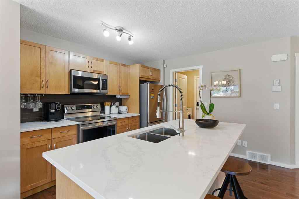 MLS® A2267895 - 19 Sage Bank Road NW in Sage Hill Calgary, Residential