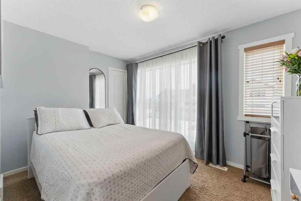 MLS® A2267895 - 19 Sage Bank Road NW in Sage Hill Calgary, Residential