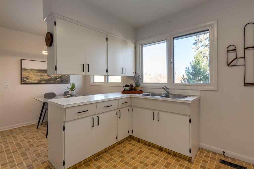 MLS® A2267917 - 126 Winston Drive SW in Westgate Calgary, Residential