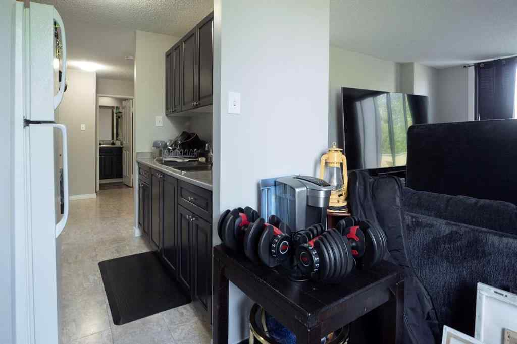 MLS® A2267925 - Unit #108 13221 MacDonald Drive  in Downtown Fort McMurray, Residential