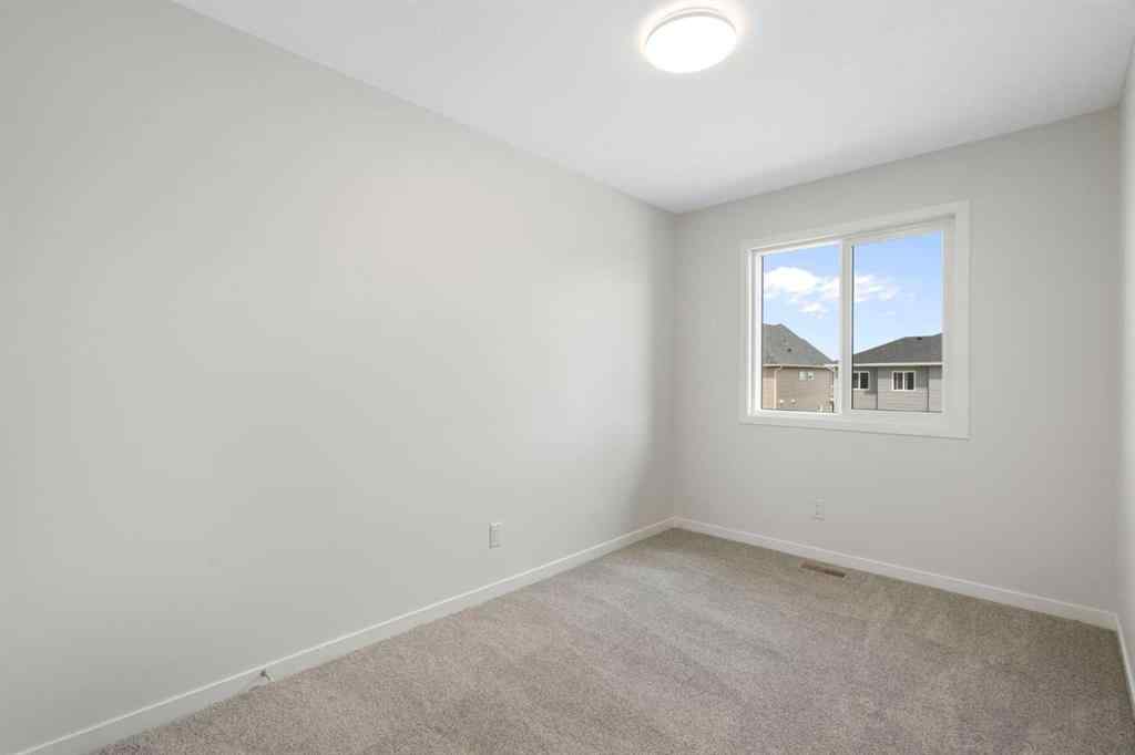 MLS® A2267959 - 135 Creekview Gardens SW in Pine Creek Calgary, Residential