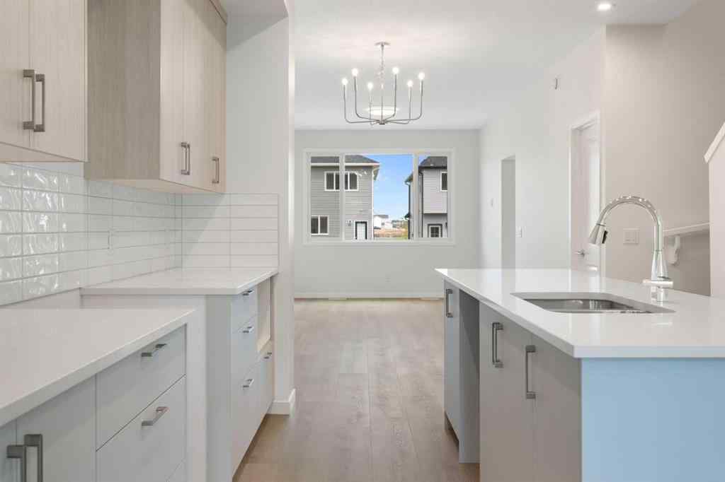 MLS® A2267959 - 135 Creekview Gardens SW in Pine Creek Calgary, Residential