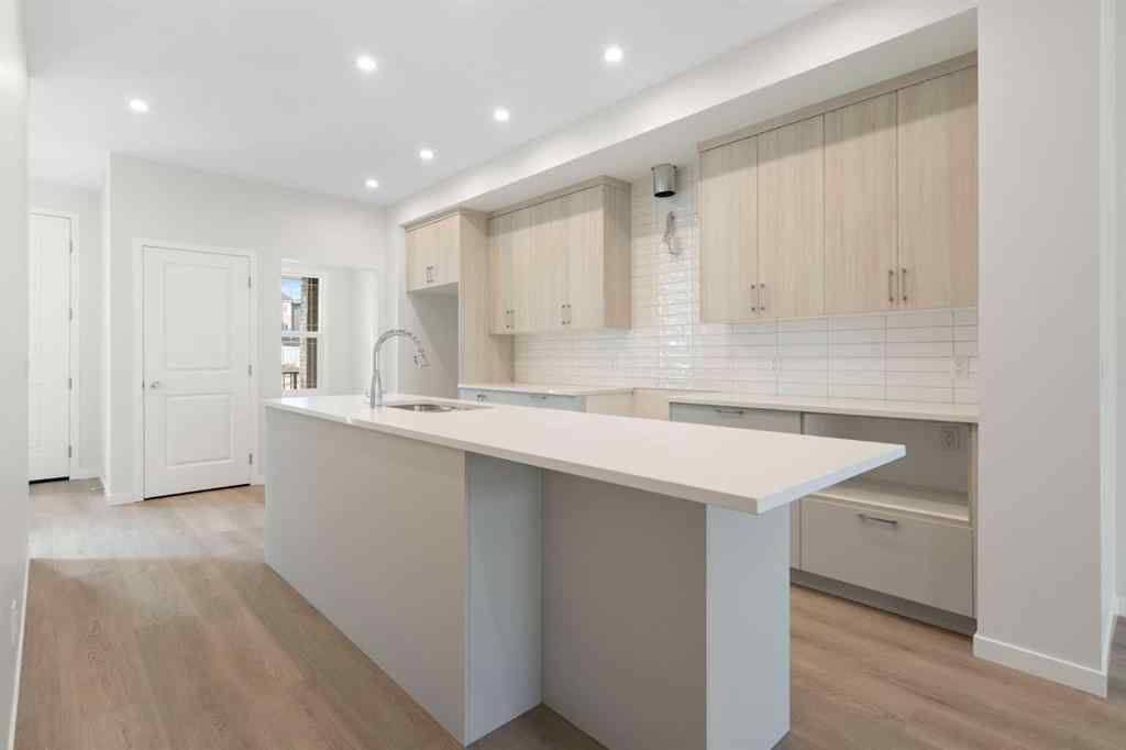 MLS® A2267959 - 135 Creekview Gardens SW in Pine Creek Calgary, Residential