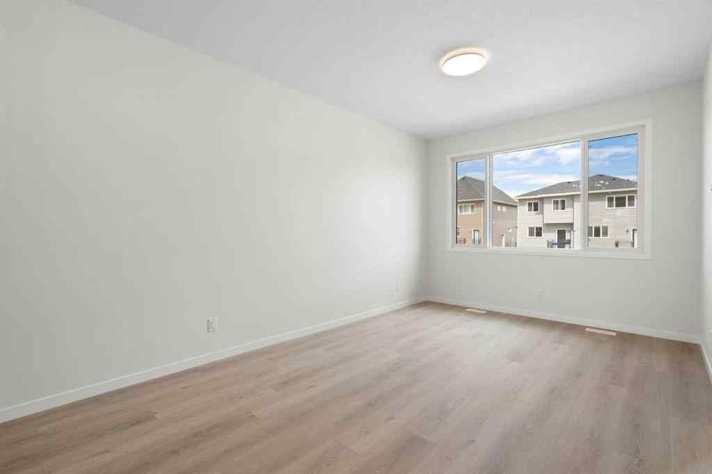 MLS® A2267959 - 135 Creekview Gardens SW in Pine Creek Calgary, Residential