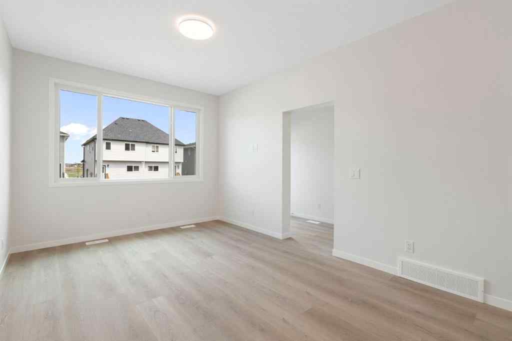 MLS® A2267959 - 135 Creekview Gardens SW in Pine Creek Calgary, Residential