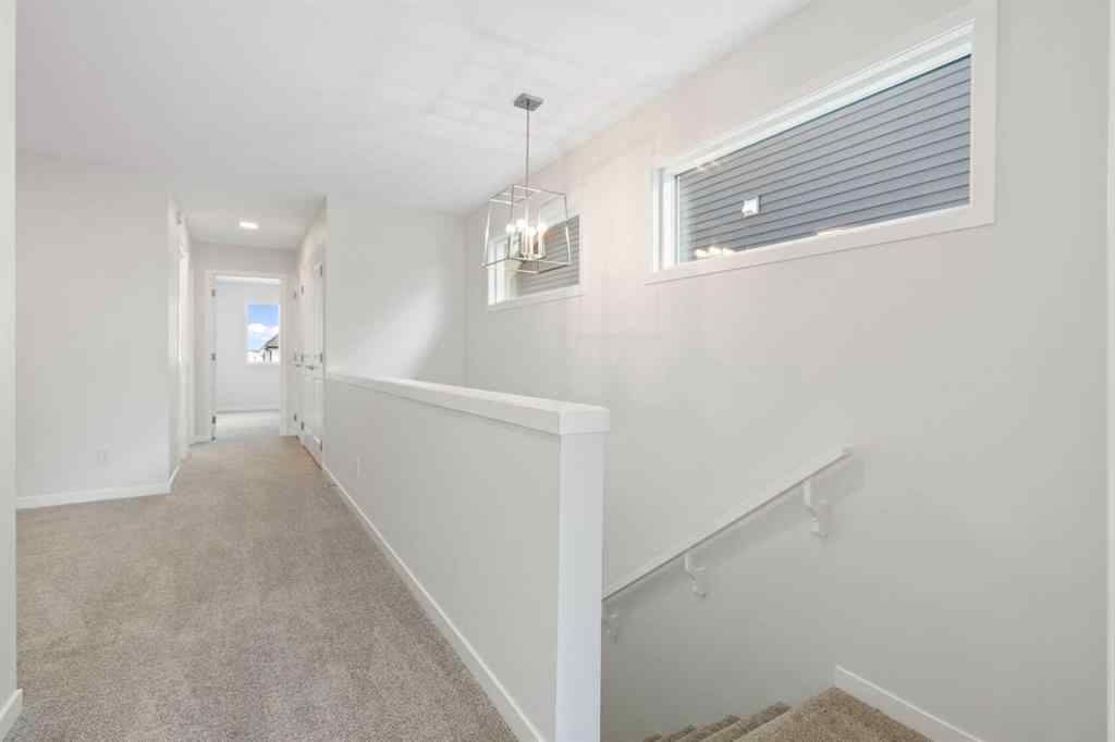 MLS® A2267959 - 135 Creekview Gardens SW in Pine Creek Calgary, Residential