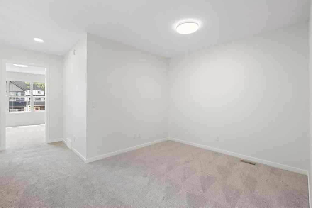 MLS® A2267959 - 135 Creekview Gardens SW in Pine Creek Calgary, Residential