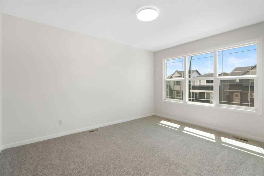 MLS® A2267959 - 135 Creekview Gardens SW in Pine Creek Calgary, Residential