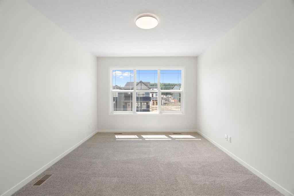 MLS® A2267959 - 135 Creekview Gardens SW in Pine Creek Calgary, Residential