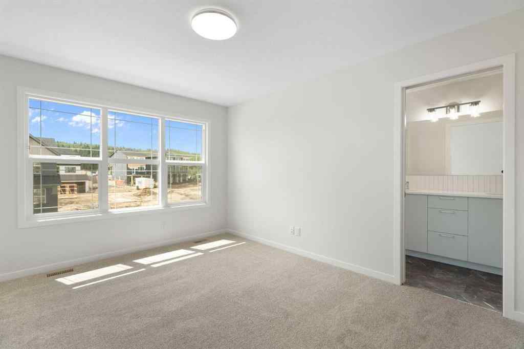 MLS® A2267959 - 135 Creekview Gardens SW in Pine Creek Calgary, Residential