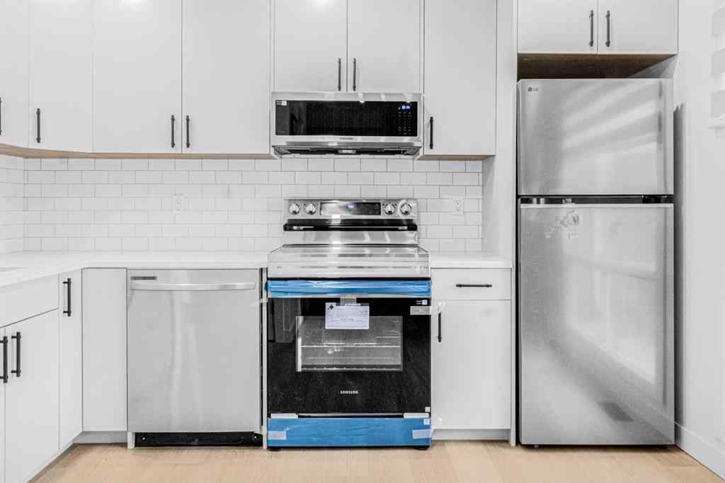 MLS® A2267968 - Unit #2 112 Erin Grove Close SE in Erin Woods Calgary, Residential