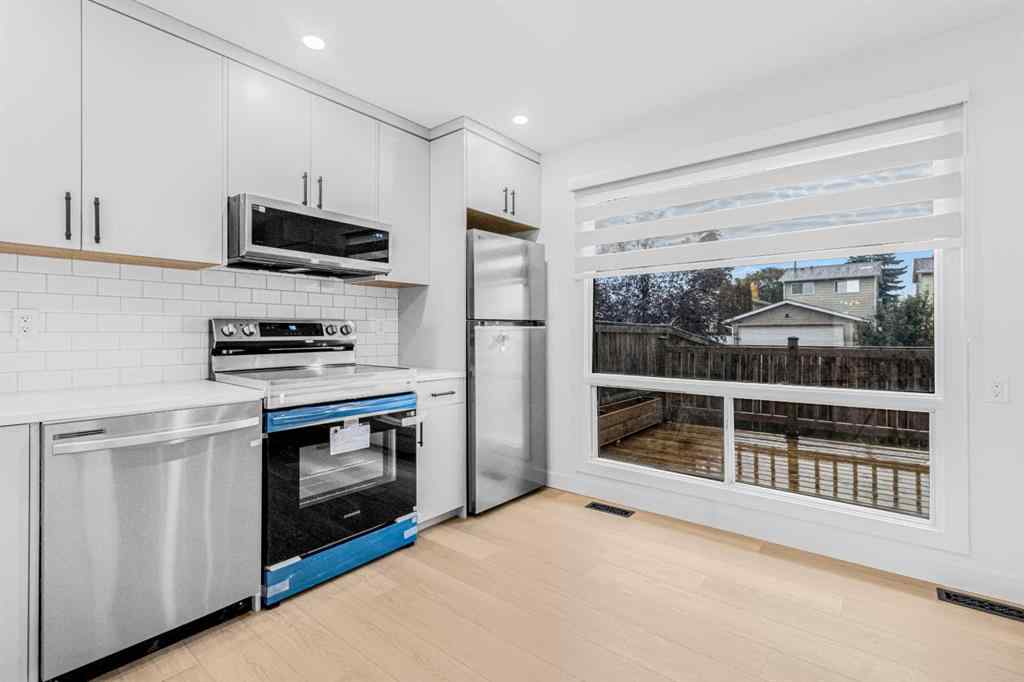 MLS® A2267968 - Unit #2 112 Erin Grove Close SE in Erin Woods Calgary, Residential