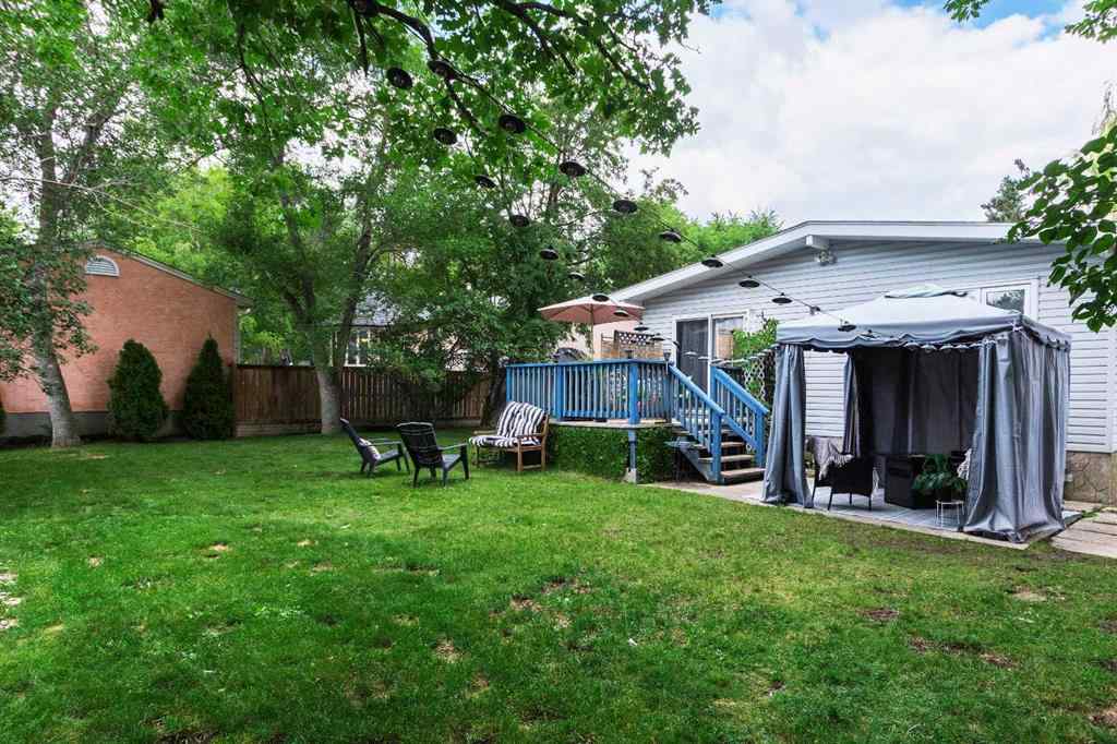 MLS® A2267981 - 823 Cannell Road SW in Canyon Meadows Calgary, Residential