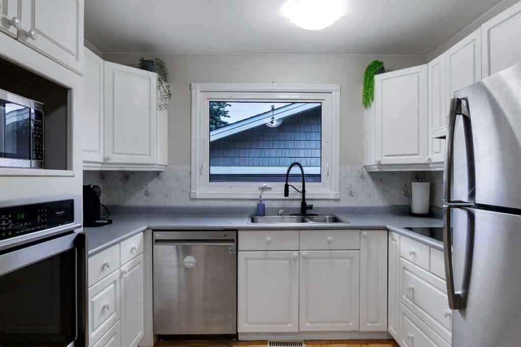 MLS® A2267981 - 823 Cannell Road SW in Canyon Meadows Calgary, Residential