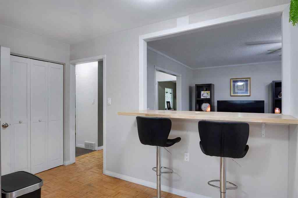 MLS® A2267981 - 823 Cannell Road SW in Canyon Meadows Calgary, Residential