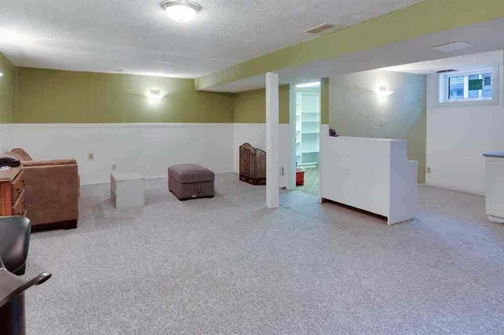 MLS® A2267981 - 823 Cannell Road SW in Canyon Meadows Calgary, Residential