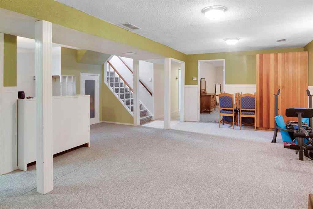 MLS® A2267981 - 823 Cannell Road SW in Canyon Meadows Calgary, Residential