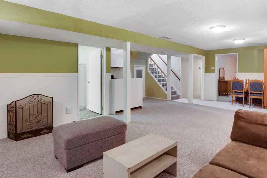 MLS® A2267981 - 823 Cannell Road SW in Canyon Meadows Calgary, Residential