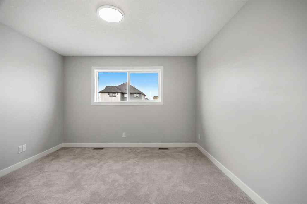 MLS® A2267984 - 163 Keystone Creek Drive NE in Keystone Hills Calgary, Residential