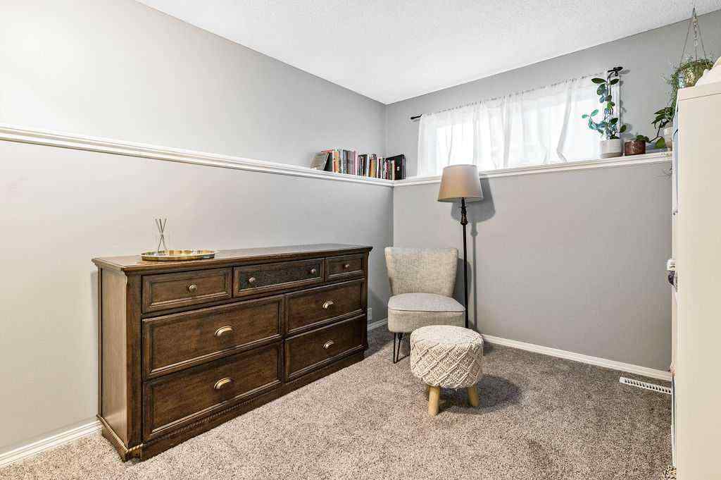 MLS® A2268013 - 106 Woodfield Close SW in Woodbine Calgary, Residential