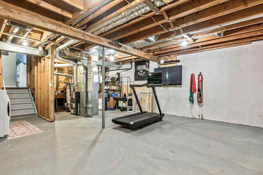 MLS® A2268013 - 106 Woodfield Close SW in Woodbine Calgary, Residential