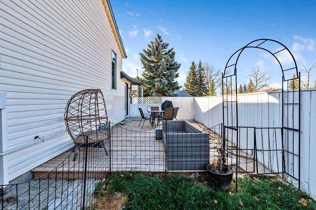 MLS® A2268013 - 106 Woodfield Close SW in Woodbine Calgary, Residential
