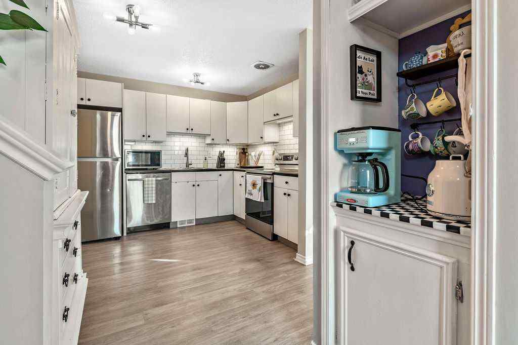 MLS® A2268013 - 106 Woodfield Close SW in Woodbine Calgary, Residential