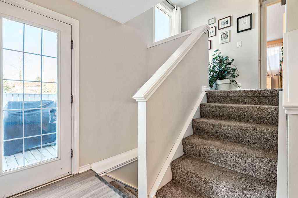 MLS® A2268013 - 106 Woodfield Close SW in Woodbine Calgary, Residential