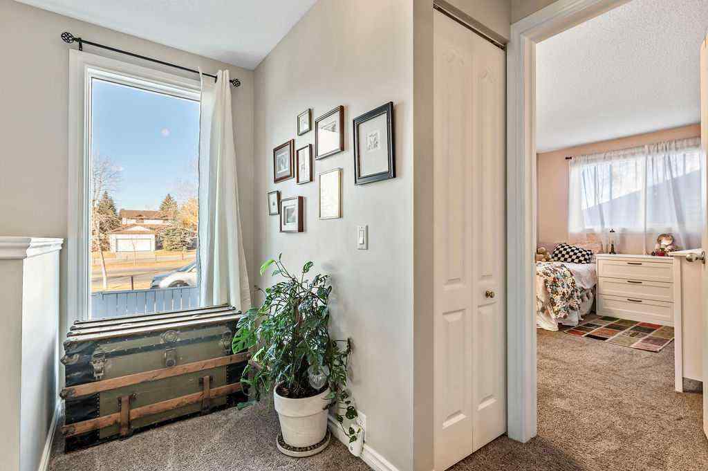 MLS® A2268013 - 106 Woodfield Close SW in Woodbine Calgary, Residential