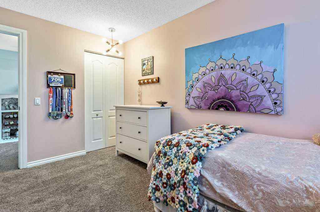 MLS® A2268013 - 106 Woodfield Close SW in Woodbine Calgary, Residential