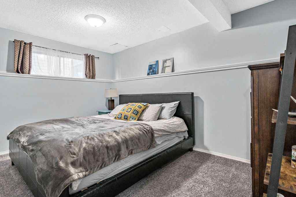 MLS® A2268013 - 106 Woodfield Close SW in Woodbine Calgary, Residential