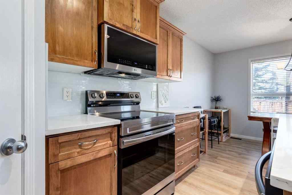 MLS® A2268023 - 90 Tuscany Springs Hill NW in Tuscany Calgary, Residential