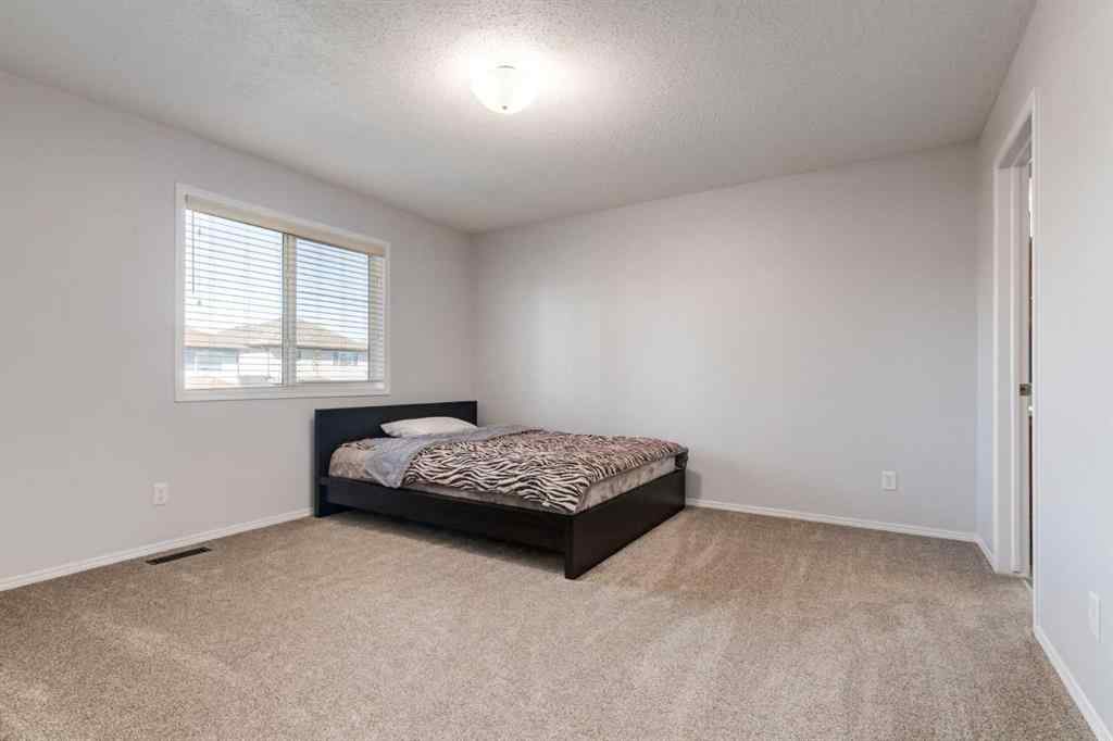 MLS® A2268023 - 90 Tuscany Springs Hill NW in Tuscany Calgary, Residential