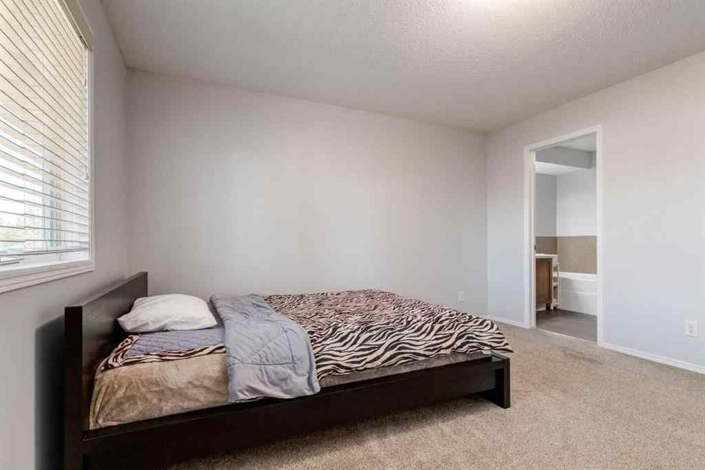 MLS® A2268023 - 90 Tuscany Springs Hill NW in Tuscany Calgary, Residential