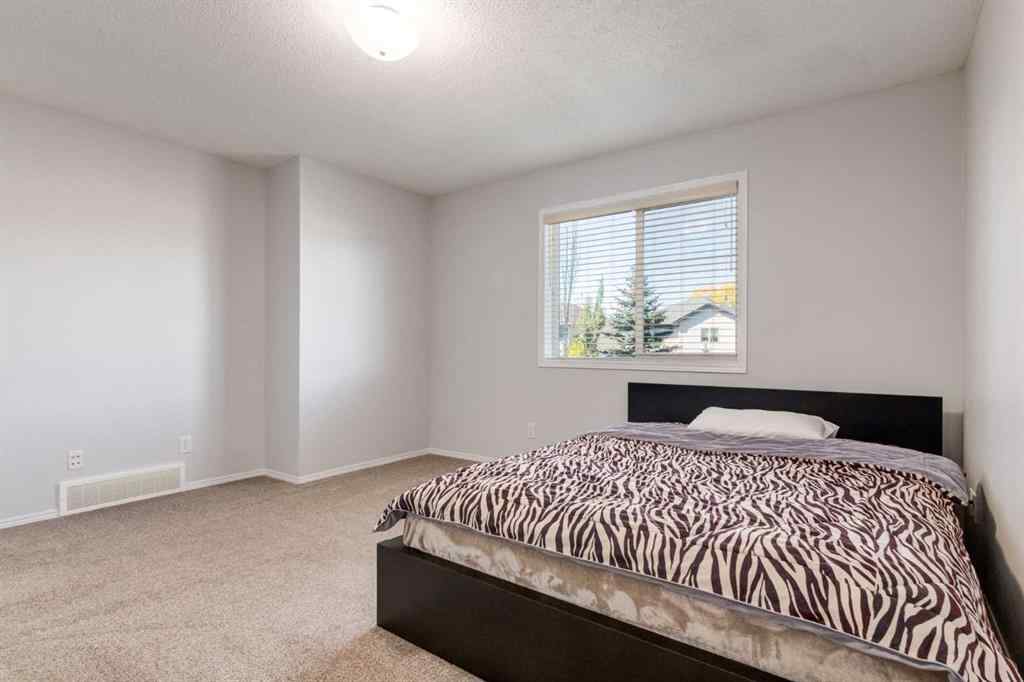 MLS® A2268023 - 90 Tuscany Springs Hill NW in Tuscany Calgary, Residential