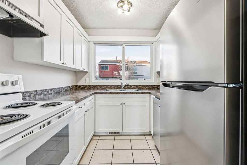 MLS® A2268026 - Unit #60 5425 Pensacola Crescent SE in Penbrooke Meadows Calgary, Residential