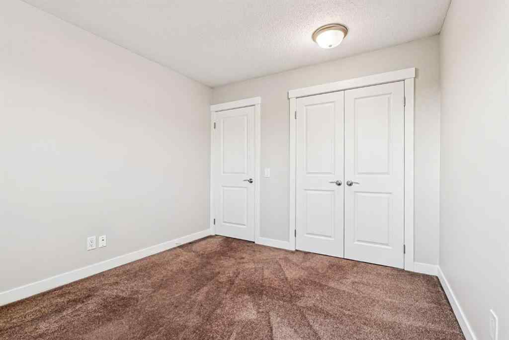 MLS® A2268026 - Unit #60 5425 Pensacola Crescent SE in Penbrooke Meadows Calgary, Residential