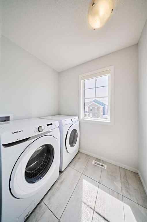 MLS® A2268033 - 254 Carringham Road NW in Carrington Calgary, Residential