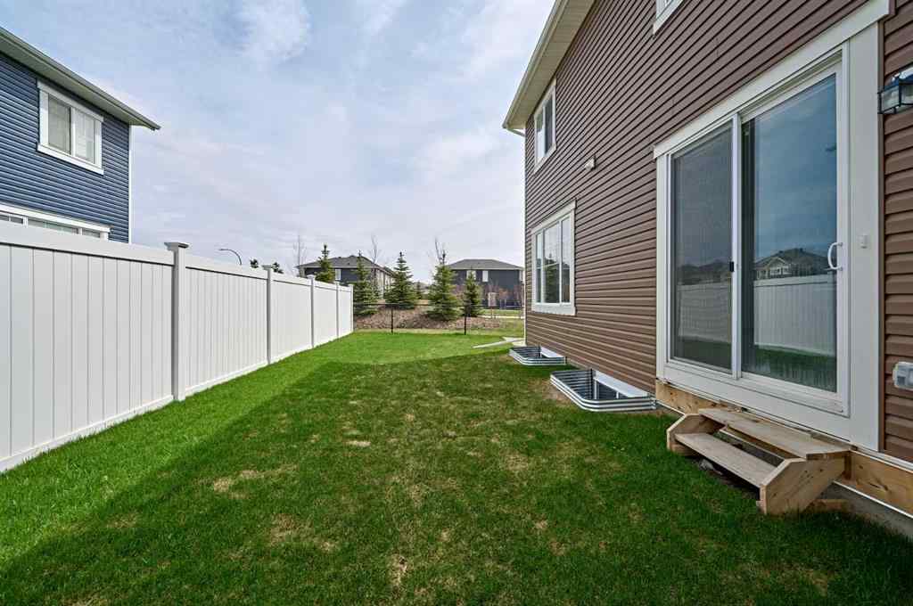 MLS® A2268033 - 254 Carringham Road NW in Carrington Calgary, Residential
