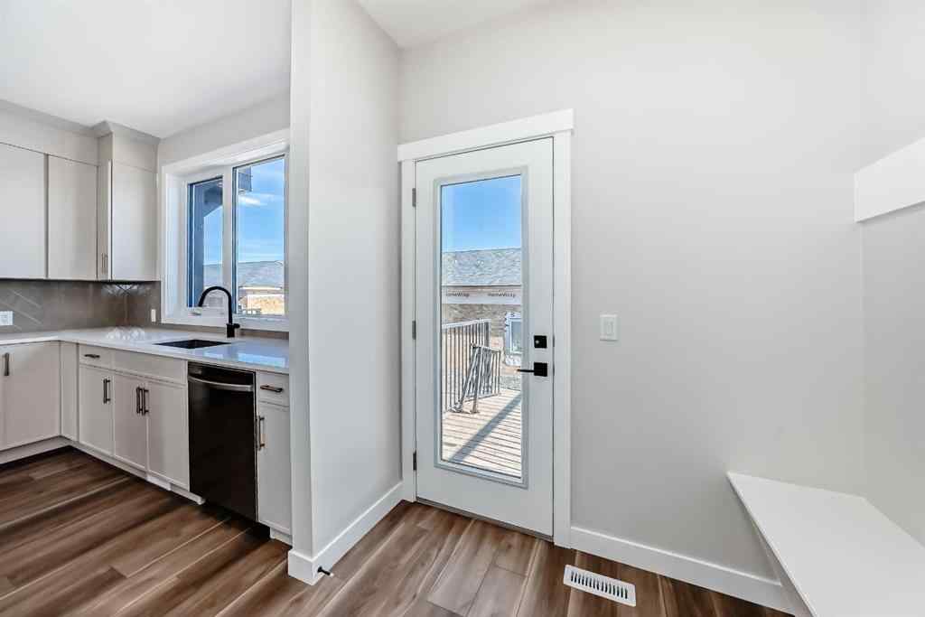 MLS® A2268036 - 1001 Reynolds Crescent SW in Coopers Crossing Airdrie, Residential