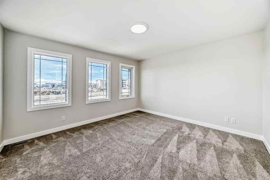 MLS® A2268036 - 1001 Reynolds Crescent SW in Coopers Crossing Airdrie, Residential