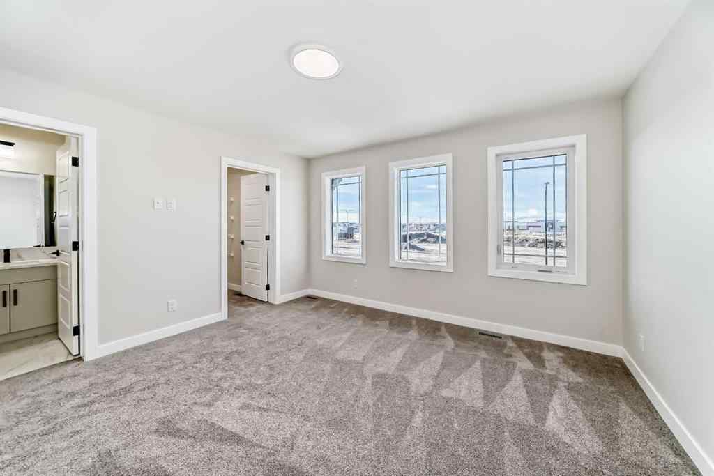 MLS® A2268036 - 1001 Reynolds Crescent SW in Coopers Crossing Airdrie, Residential