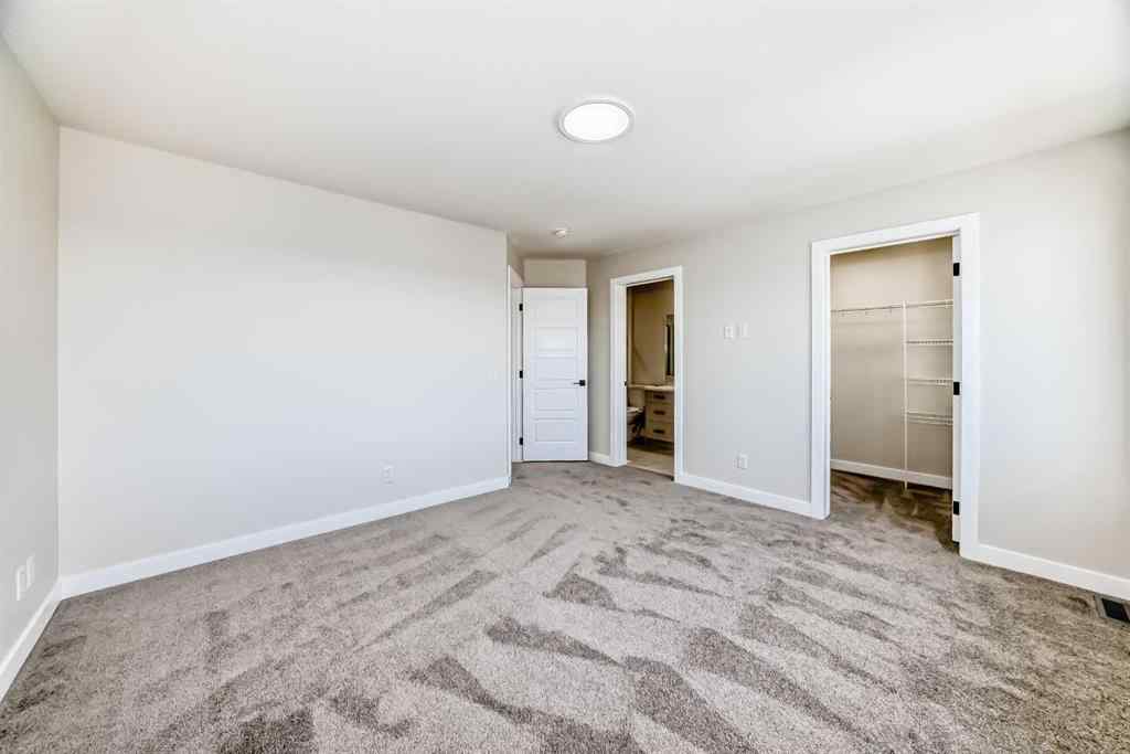 MLS® A2268036 - 1001 Reynolds Crescent SW in Coopers Crossing Airdrie, Residential