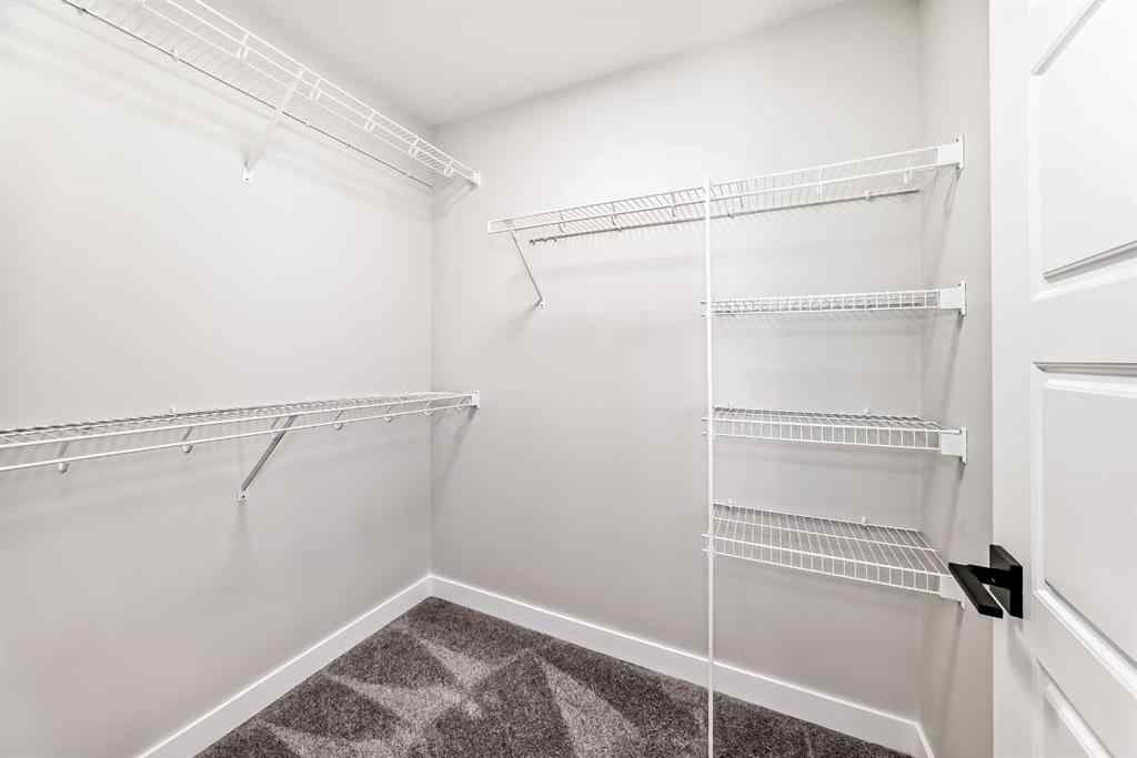 MLS® A2268036 - 1001 Reynolds Crescent SW in Coopers Crossing Airdrie, Residential